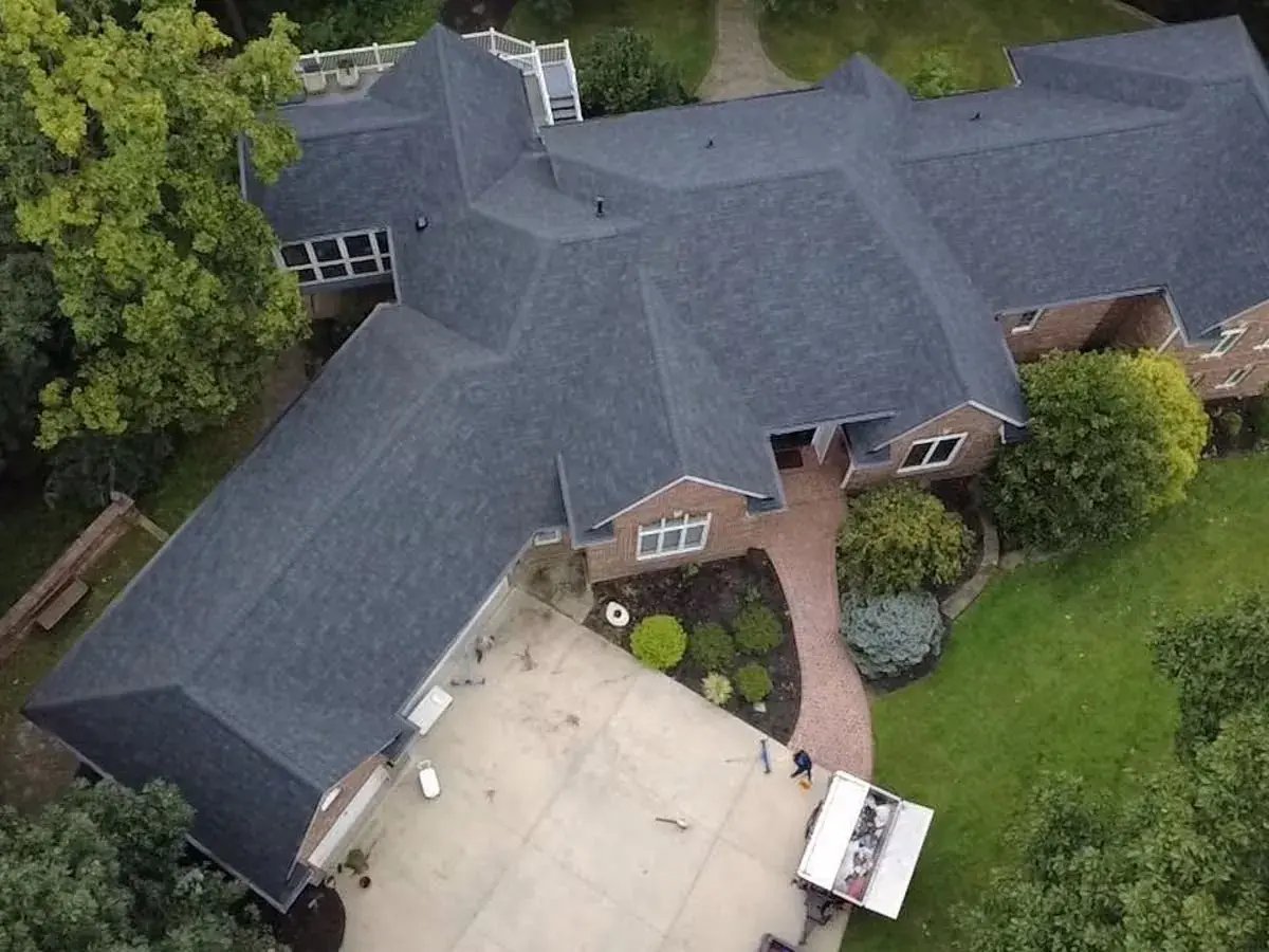New shingle roof on a large brick ranch home