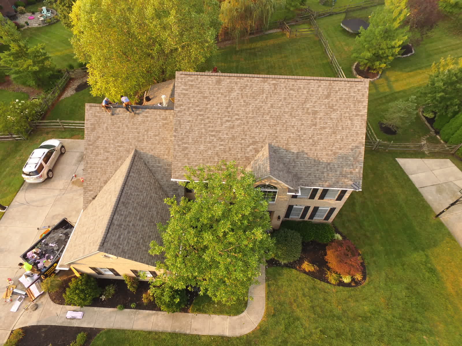 Drone photo of a roof replacement: the new shingle roof nearly finished
