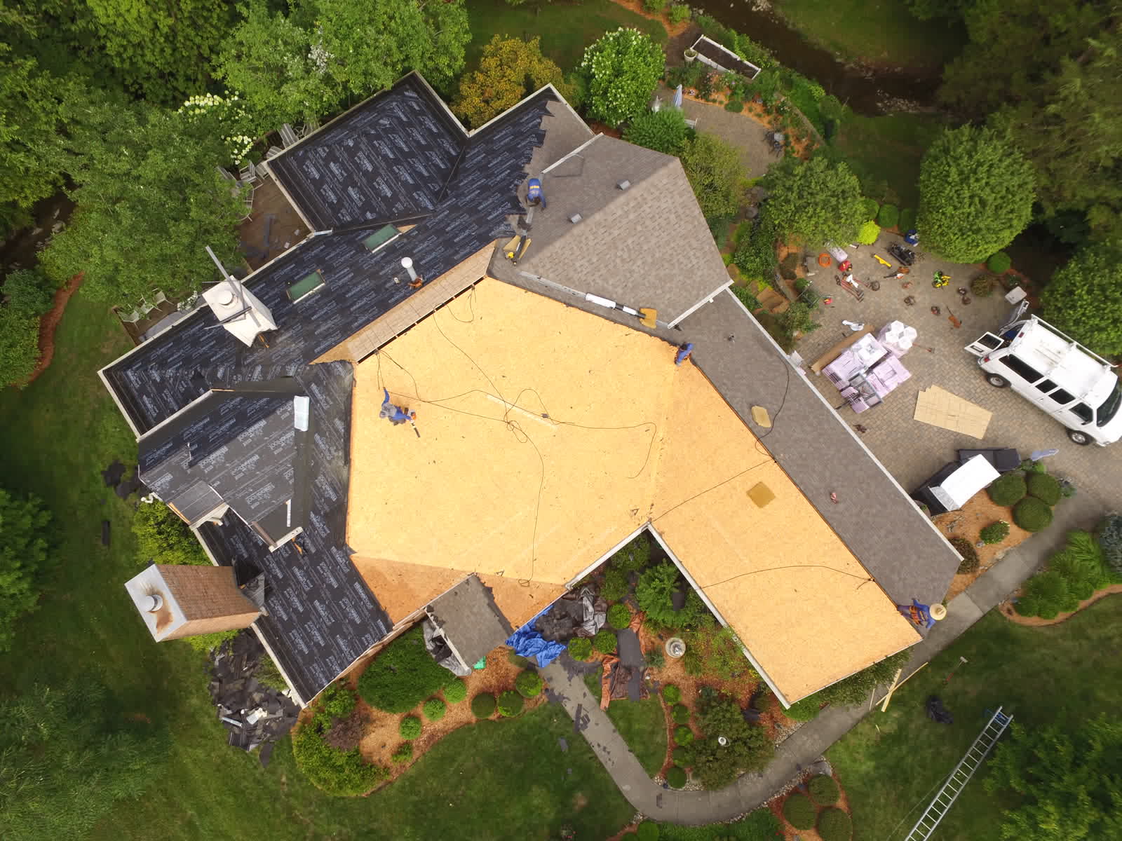 Drone photo of a roof replacement: underlayment going down